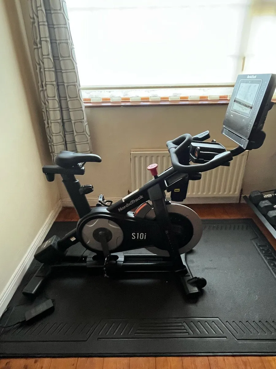 NordicTrack s10i Commercial Studio Bike with Mat - Image 1