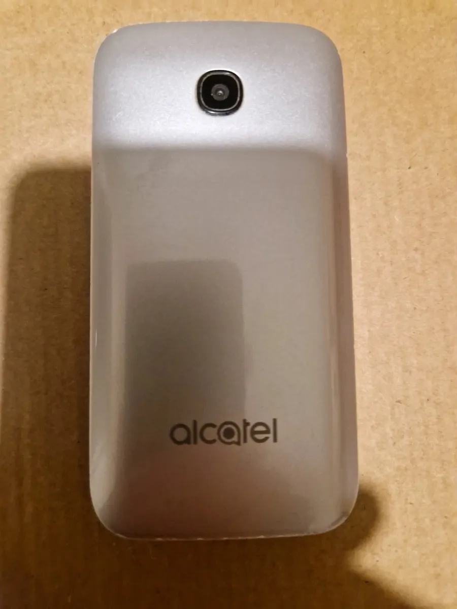 Silver Alcatel Large number flip phone - Image 1
