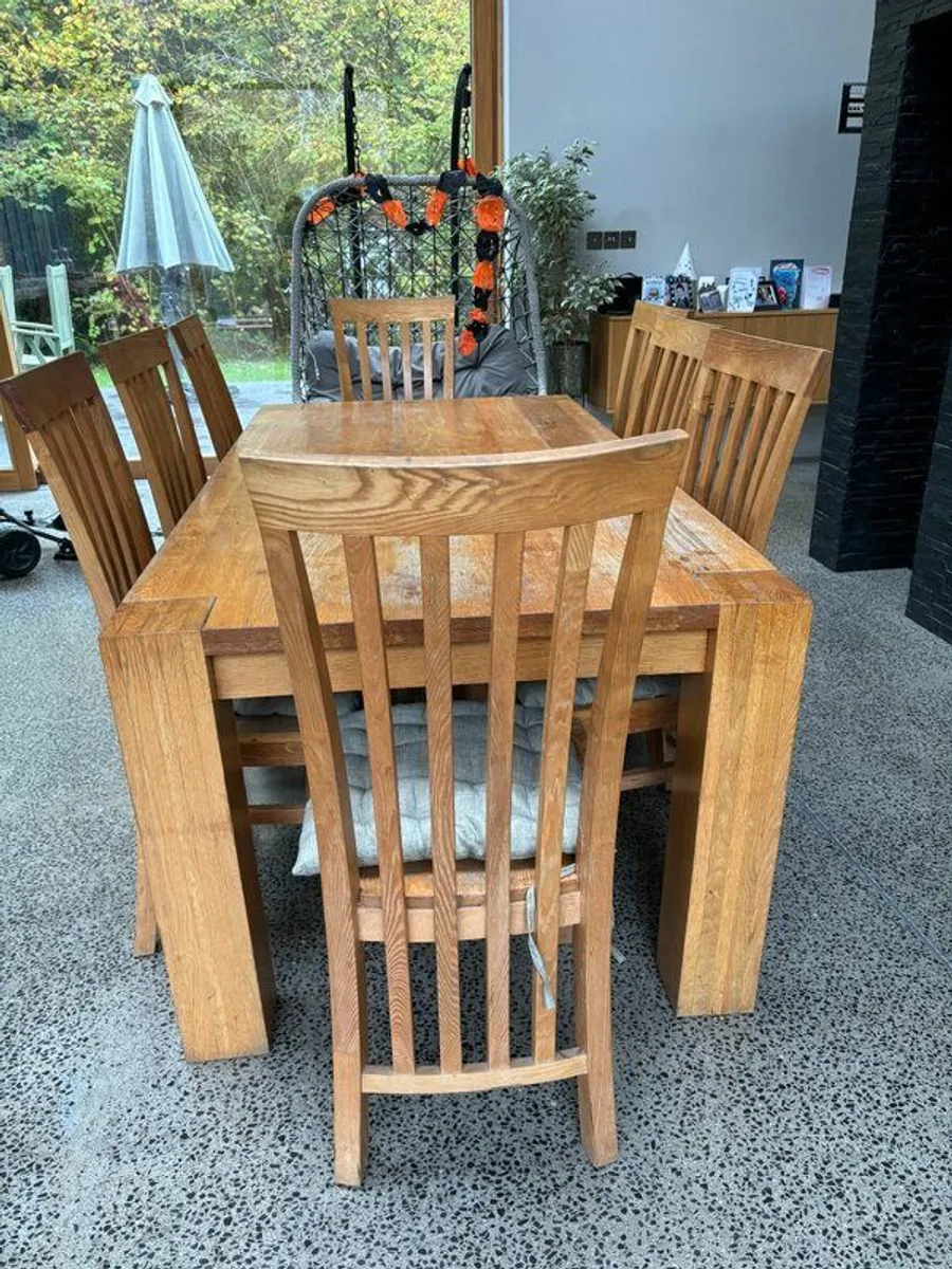 Kitchen table and 8 chairs - Image 1
