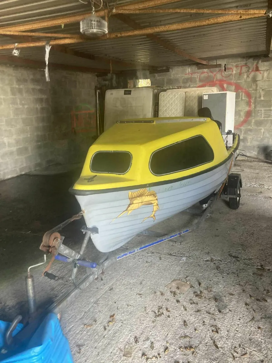Fishing boat and outboard - Image 1