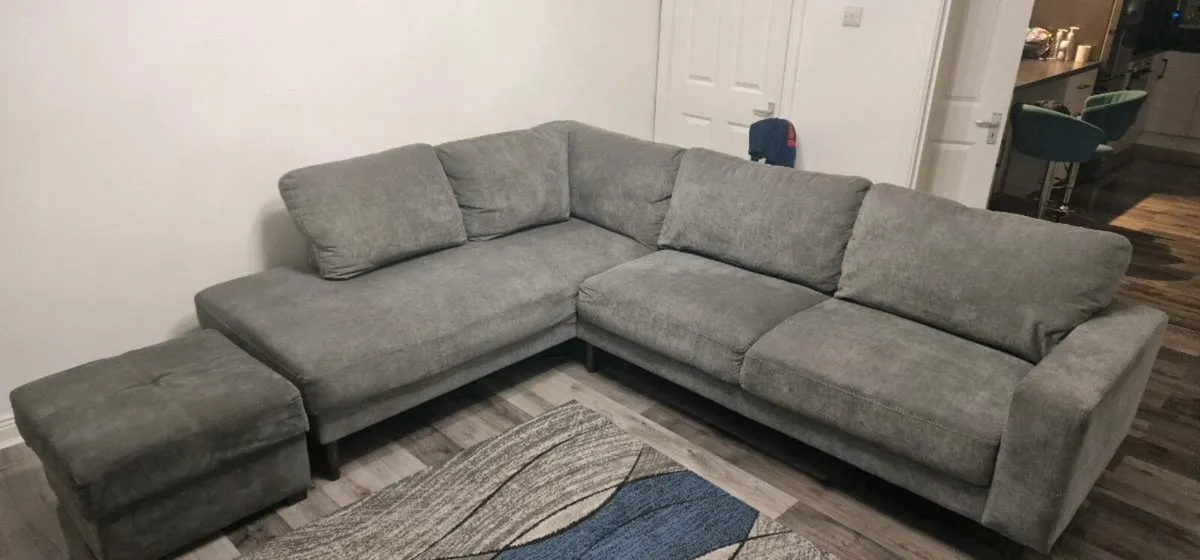 L shaped sofa with pouffe - Image 1