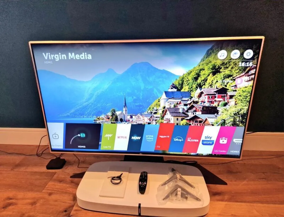 LG 49inch 4K Smart TV + Sonos Playbase + Sanus Swivel Stand - Complete Premium Setup - Image 1