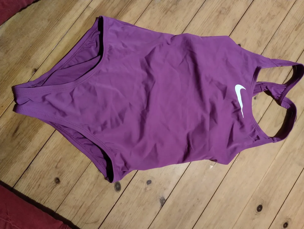 Wetsuit and swimming suit - Image 1