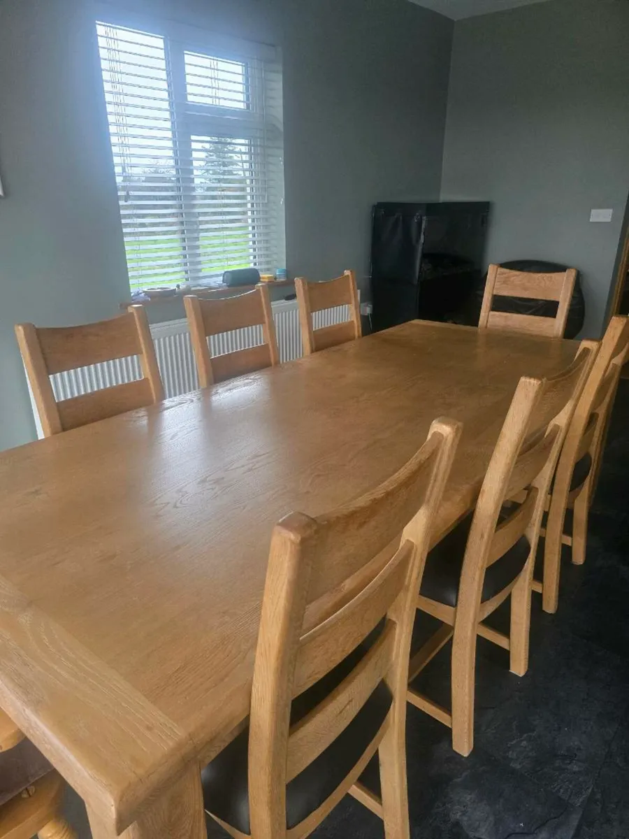 Oak Dining table with 6-8 chairs - Image 1