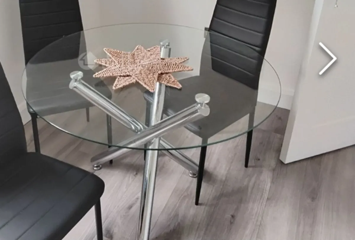 Glass table with silver legs - Image 1