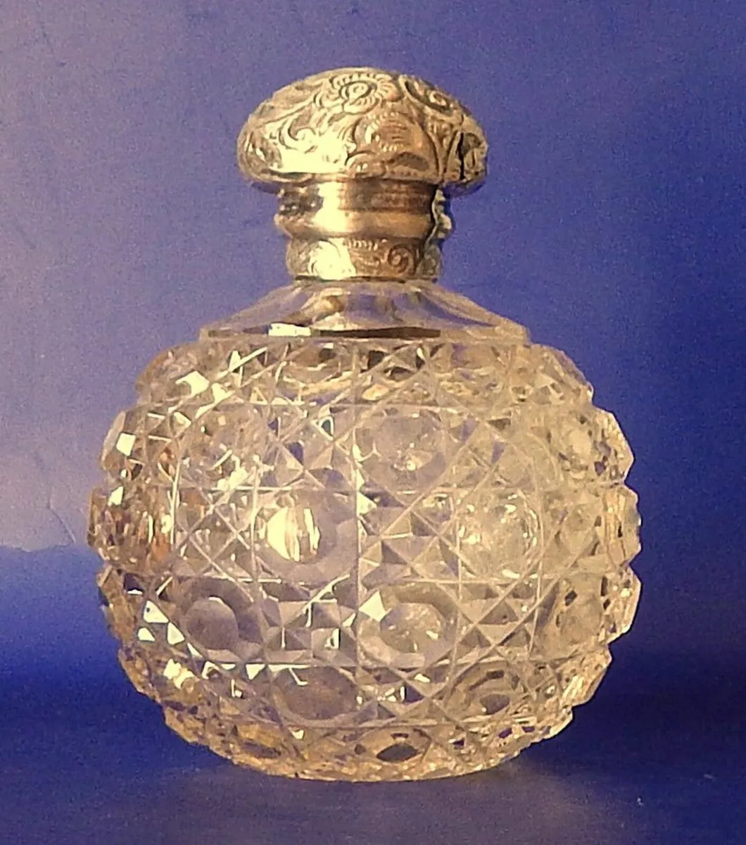 Antique Cut Glass Perfume Bottle with Silver Top - Image 1
