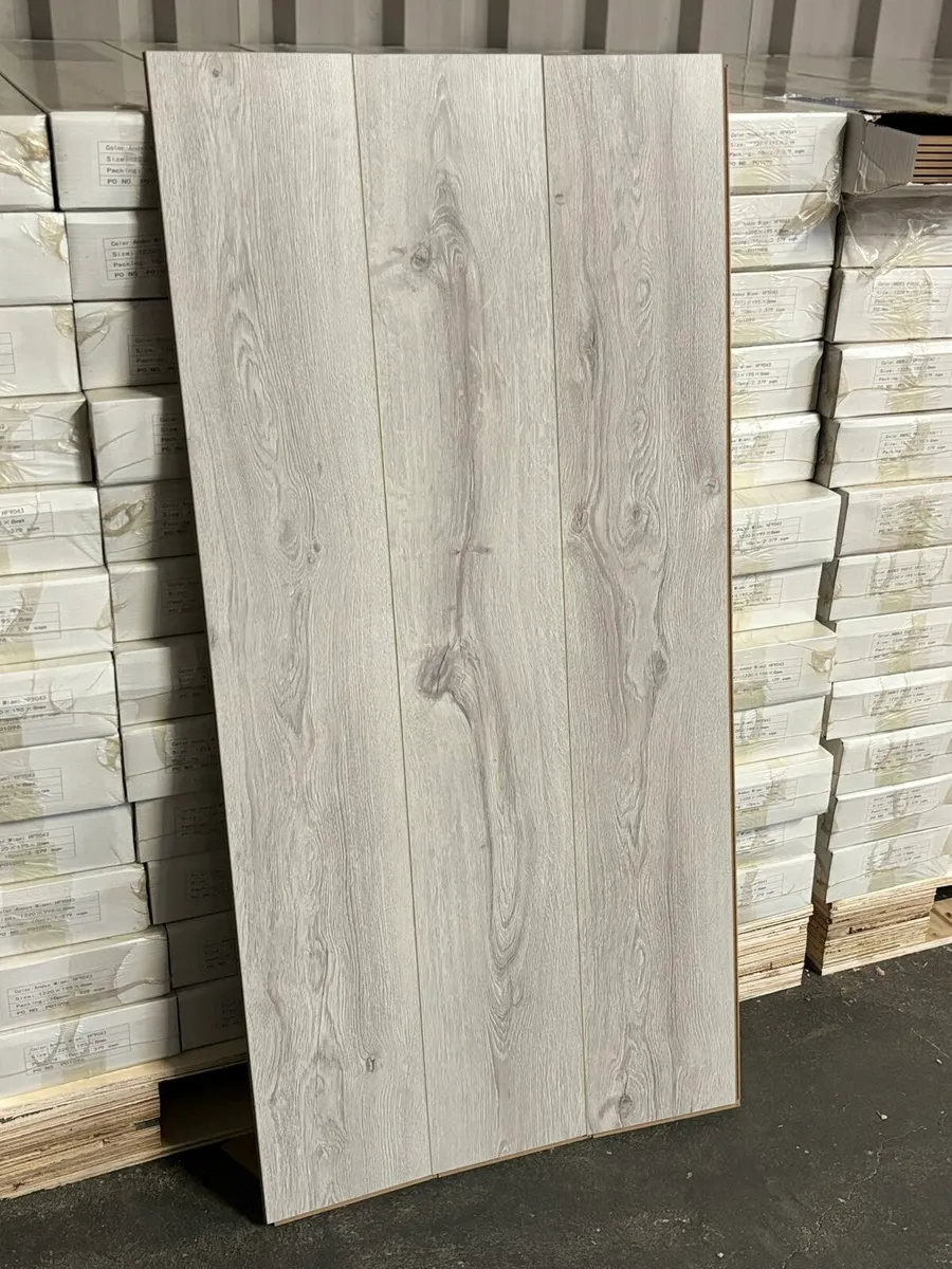 New 12MM High Gloss Flooring - Image 1