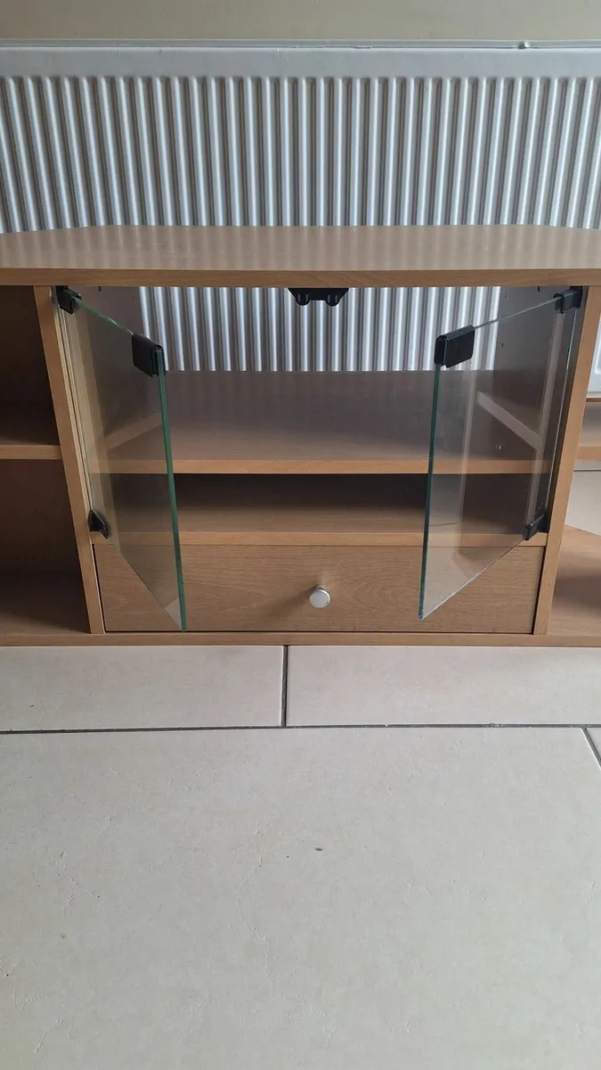 Wooden TV stand with glass doors and storage drawe - Image 2