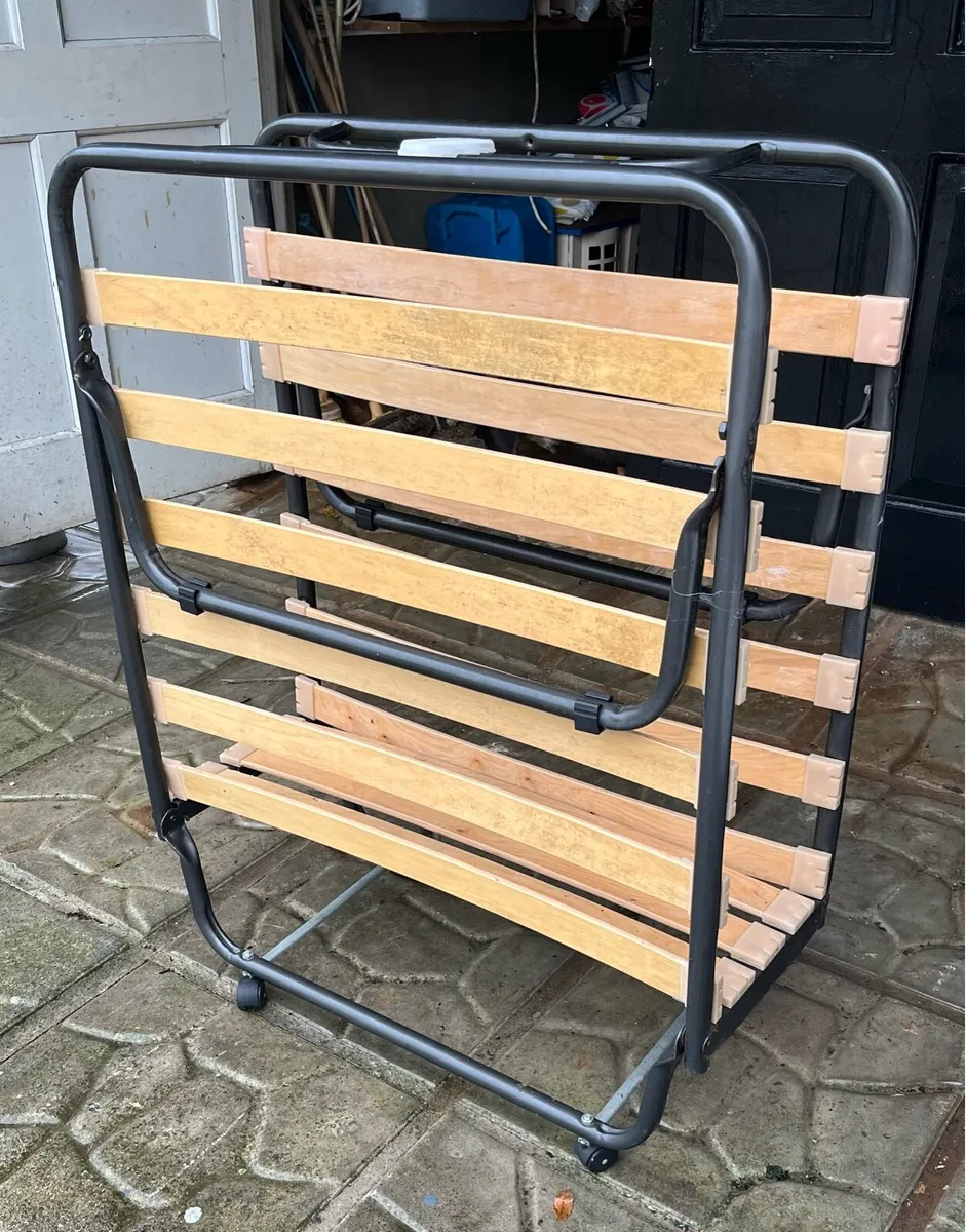 Two folding single beds with mattresses - Image 1