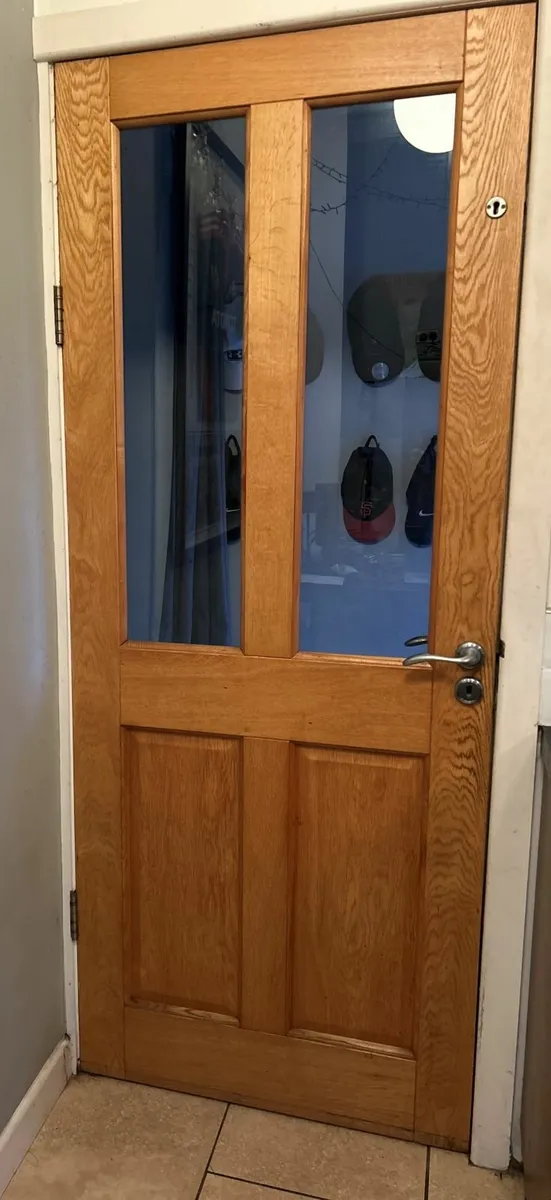 Solid door with glass panels