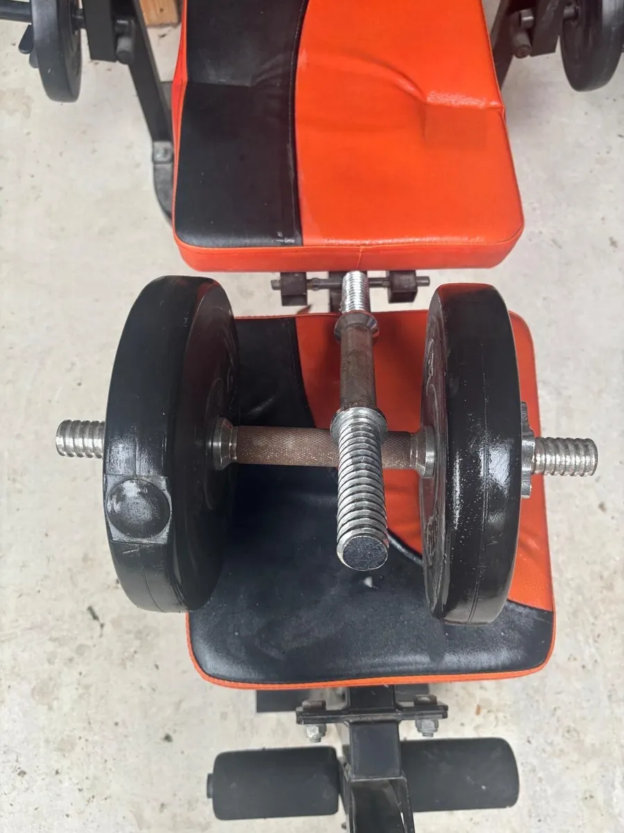 Adjustable weight bench and weights - Image 1