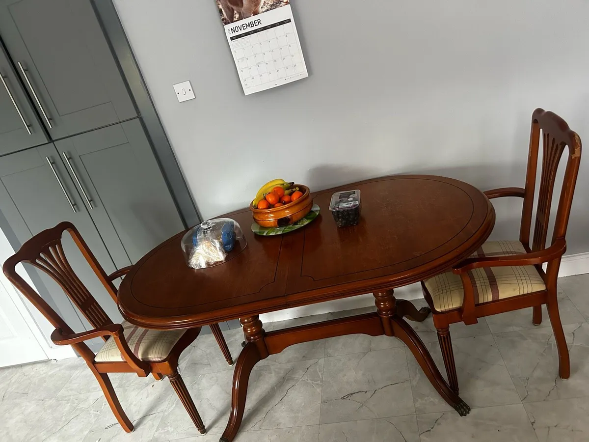 Dining table (All 6 Chairs Included) NEED GONE