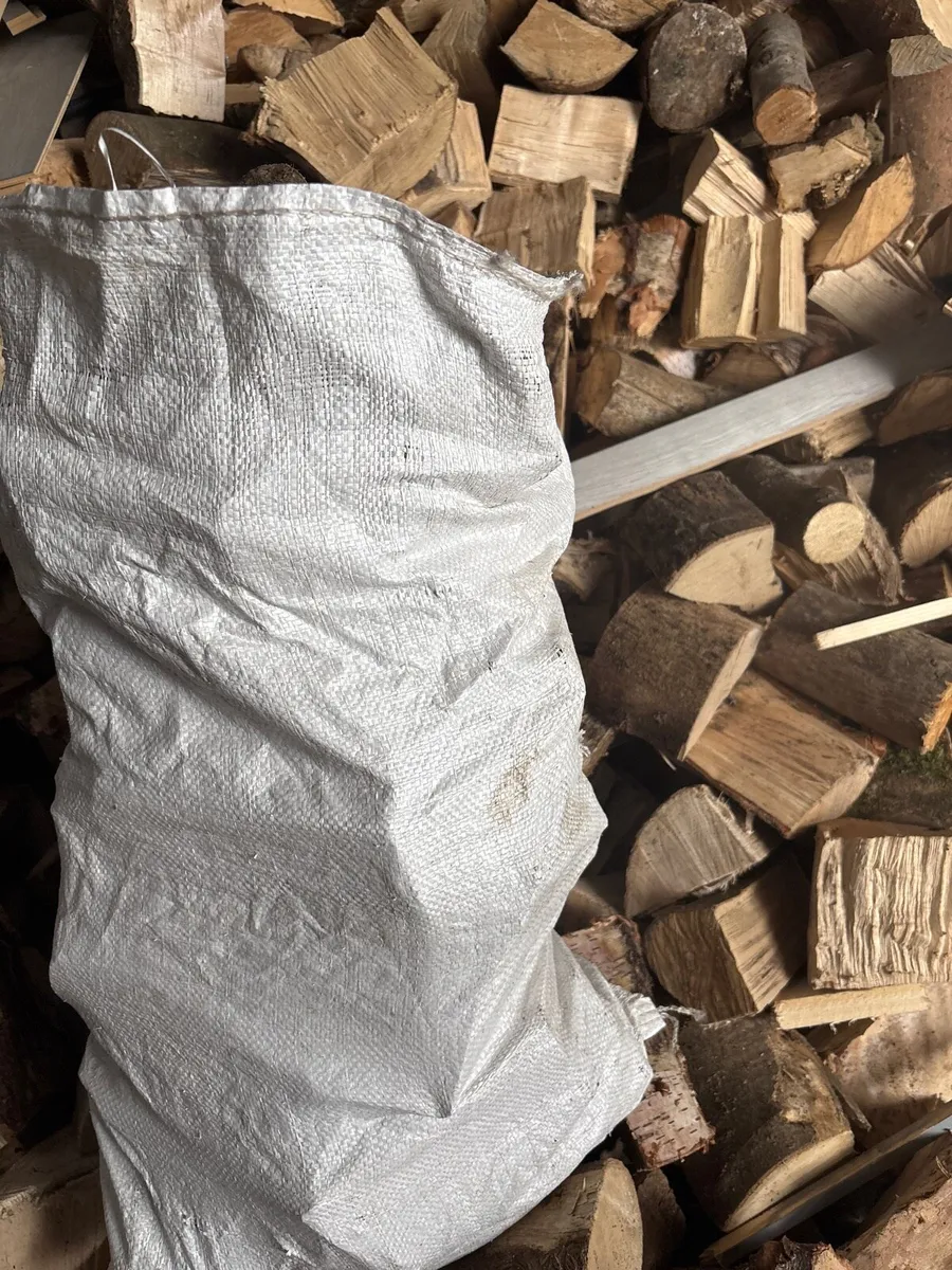 Bags of timber and trailer load of timber 8x4