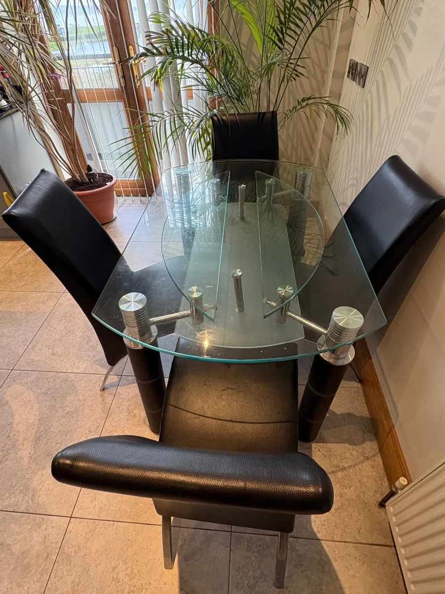Dining table and four chairs - Image 1