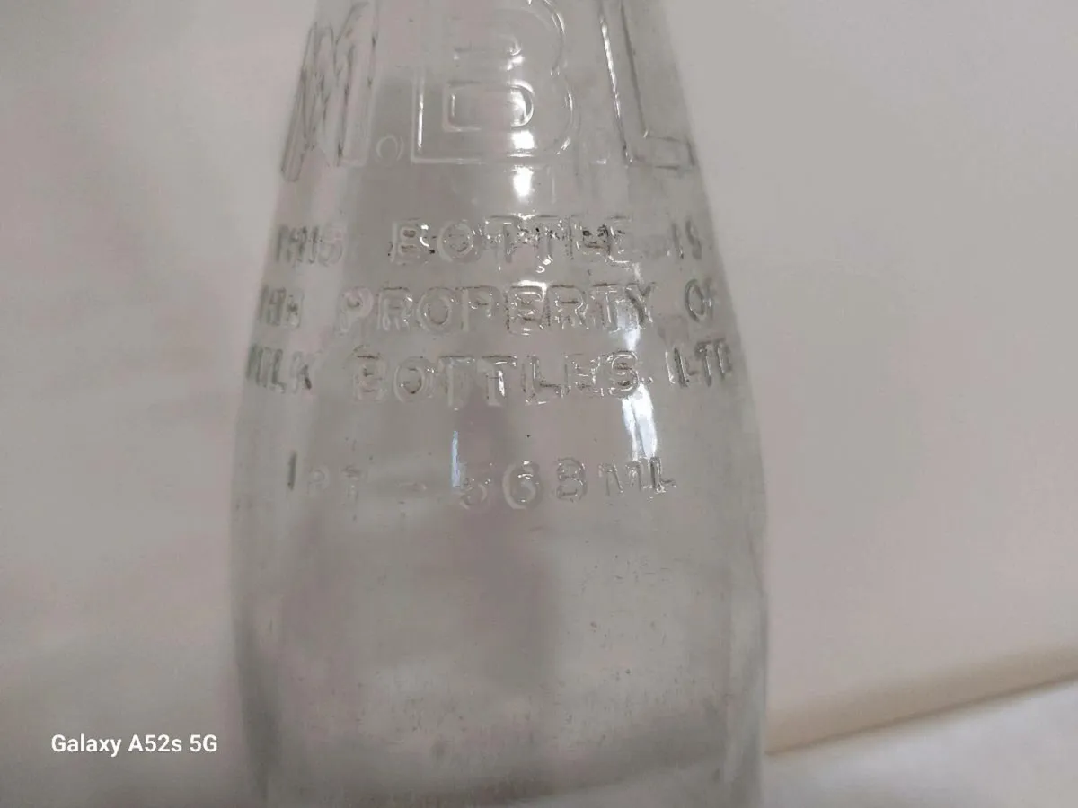 Vintage glass milk bottle - Image 1