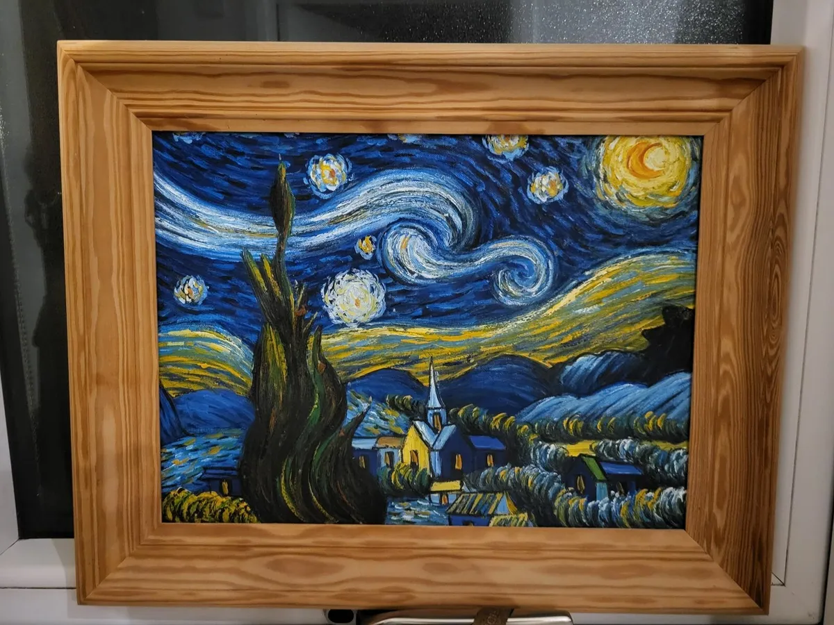 The starry night by Van Gogh in wooden frame