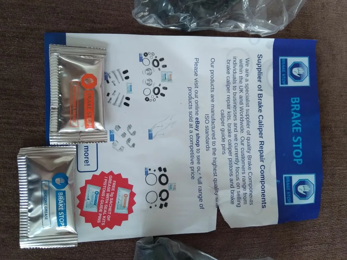 Pair of car brake caliper repair kit - Image 1