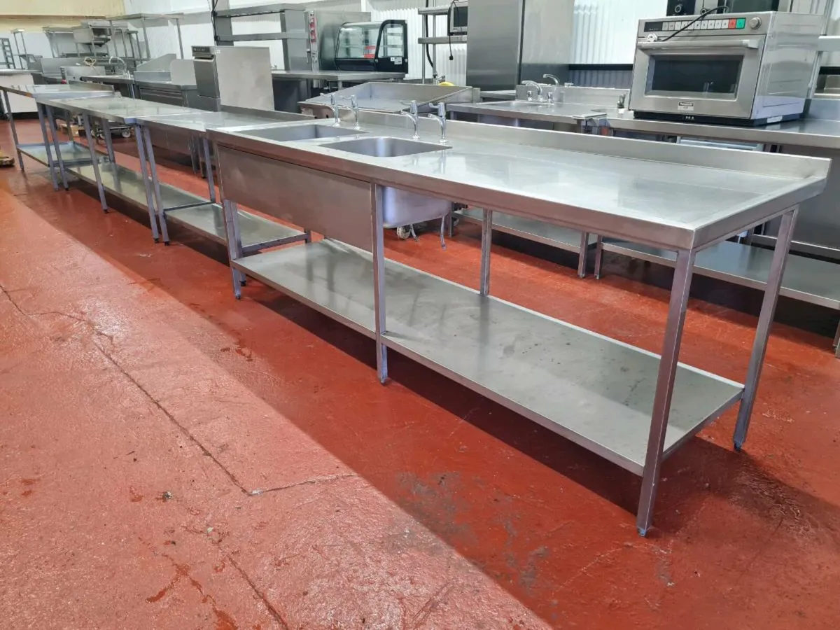 Stainless steel tables and sinks - Image 1