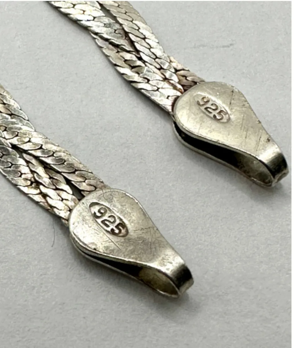 A Pair of Italian Sterling Silver Braided Bracelet - Image 2