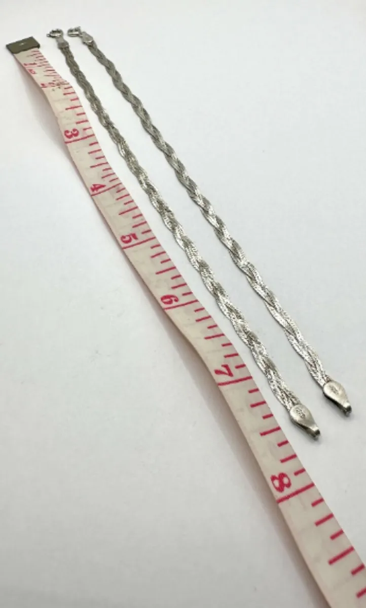 A Pair of Italian Sterling Silver Braided Bracelet - Image 3