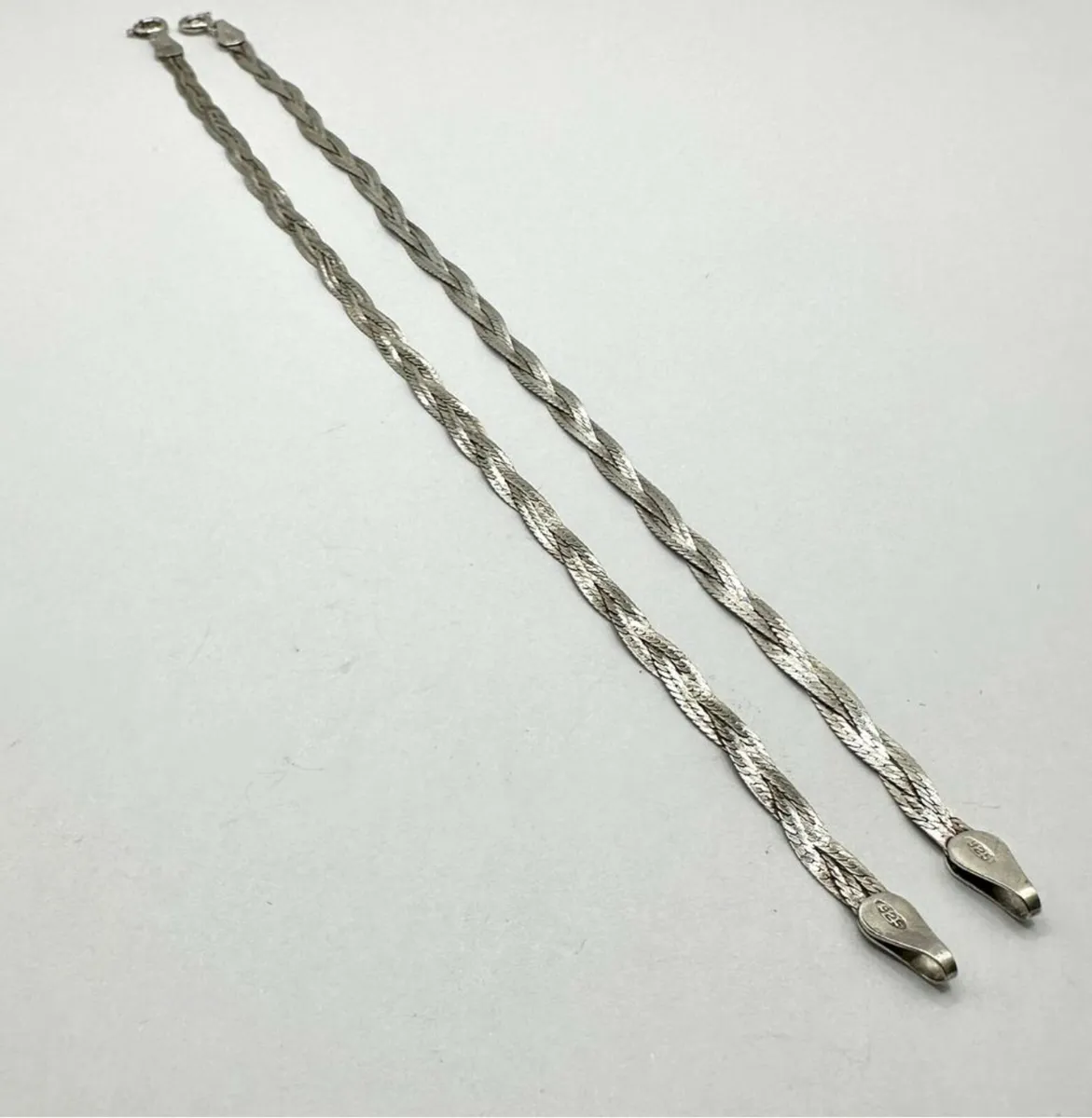 A Pair of Italian Sterling Silver Braided Bracelet - Image 4