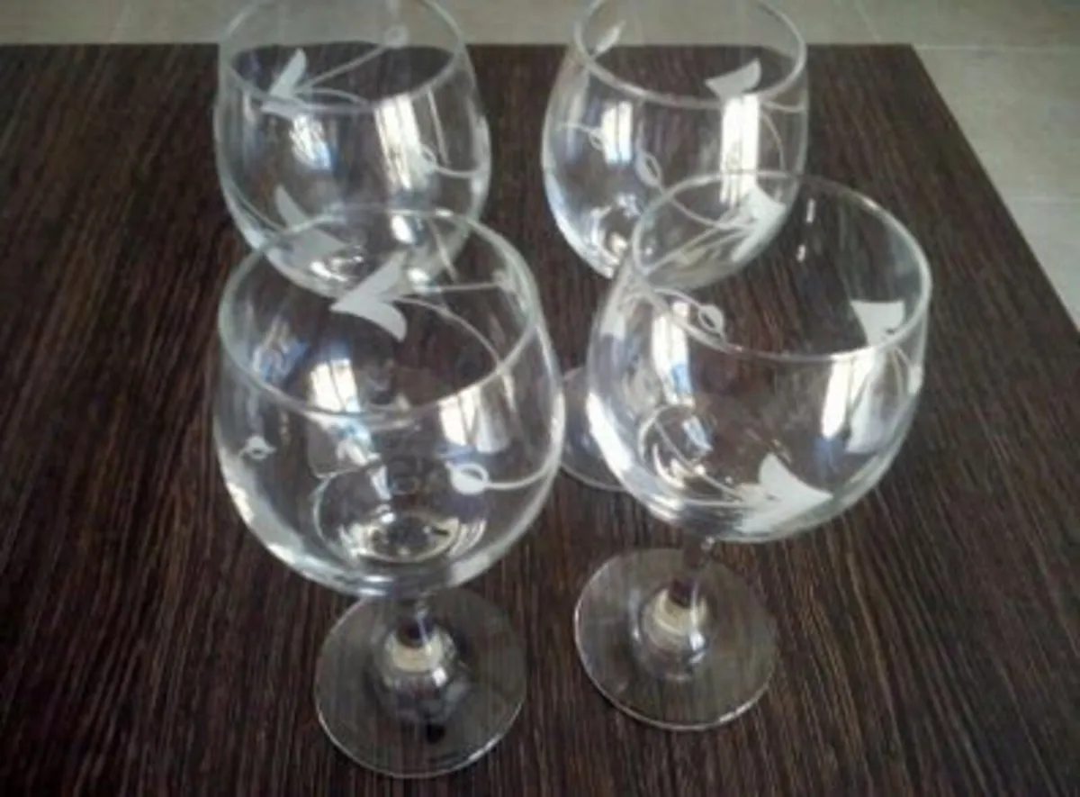 Wine Glasses with Etched Motif on Glass.