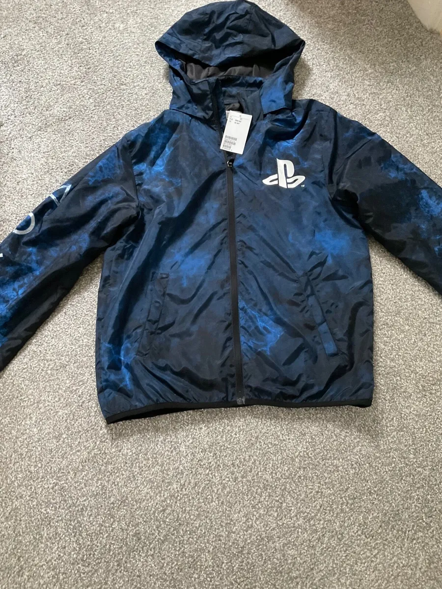 Boys raincoat, 12 to 14, brand new - Image 3