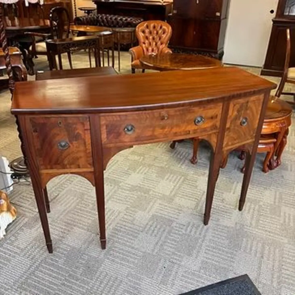 19th century mahogany inlaid bow shaped sideboard.