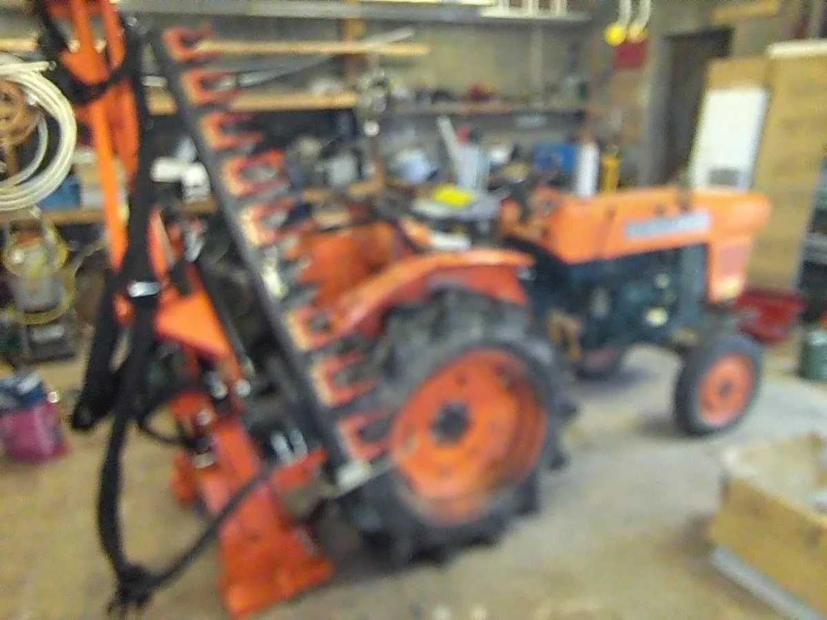 Hedge cutter with compact tractor - Image 1