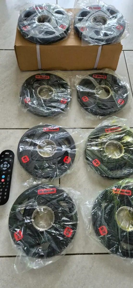 Brand new 8x2.5kilo Olympic weight plates - Image 4