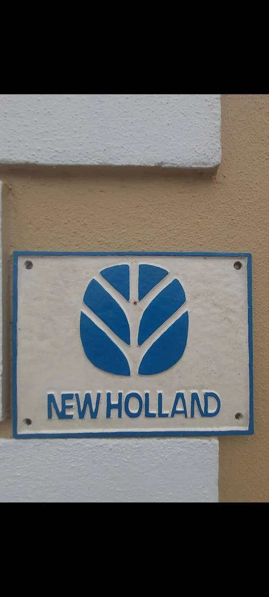 Newhollond cast iron sign