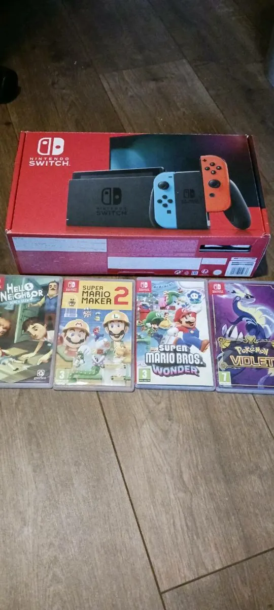 Nintendo switch console plus extras - Image 1