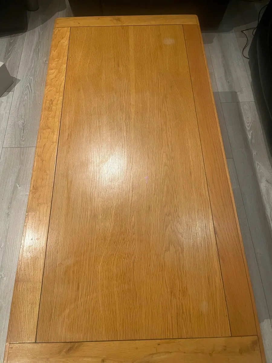 A coffee table with underneath shelf - Image 2