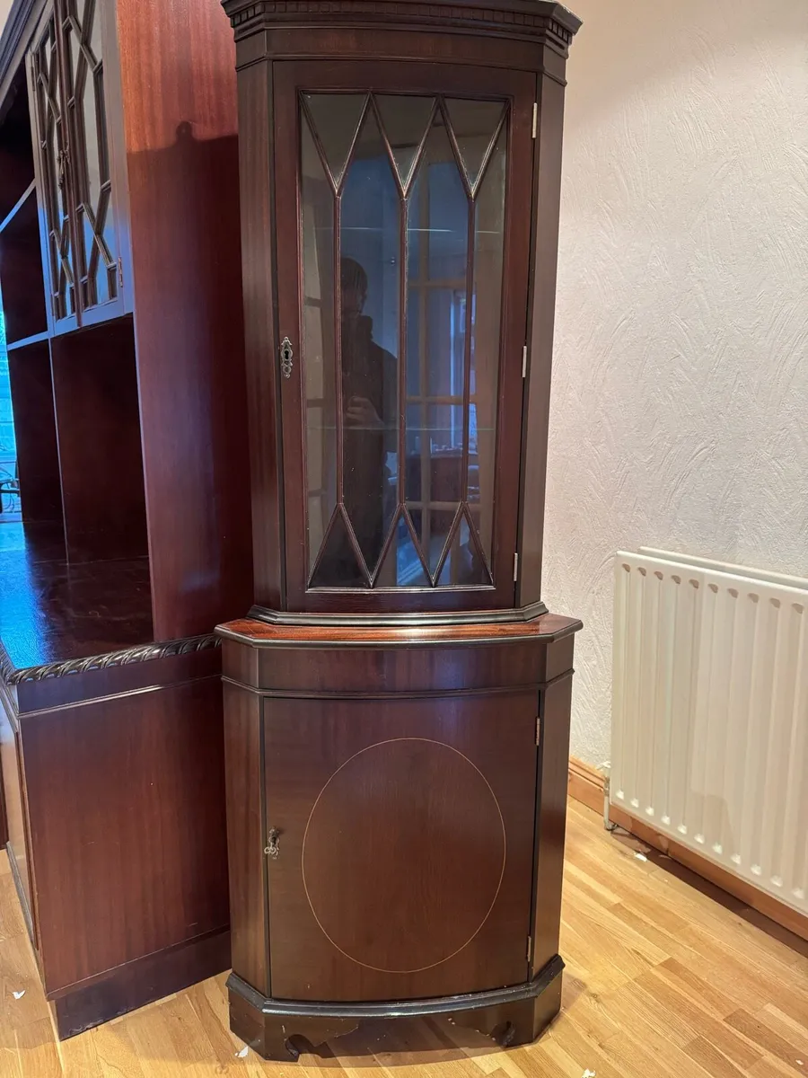 Traditional dark wood corner cabinet