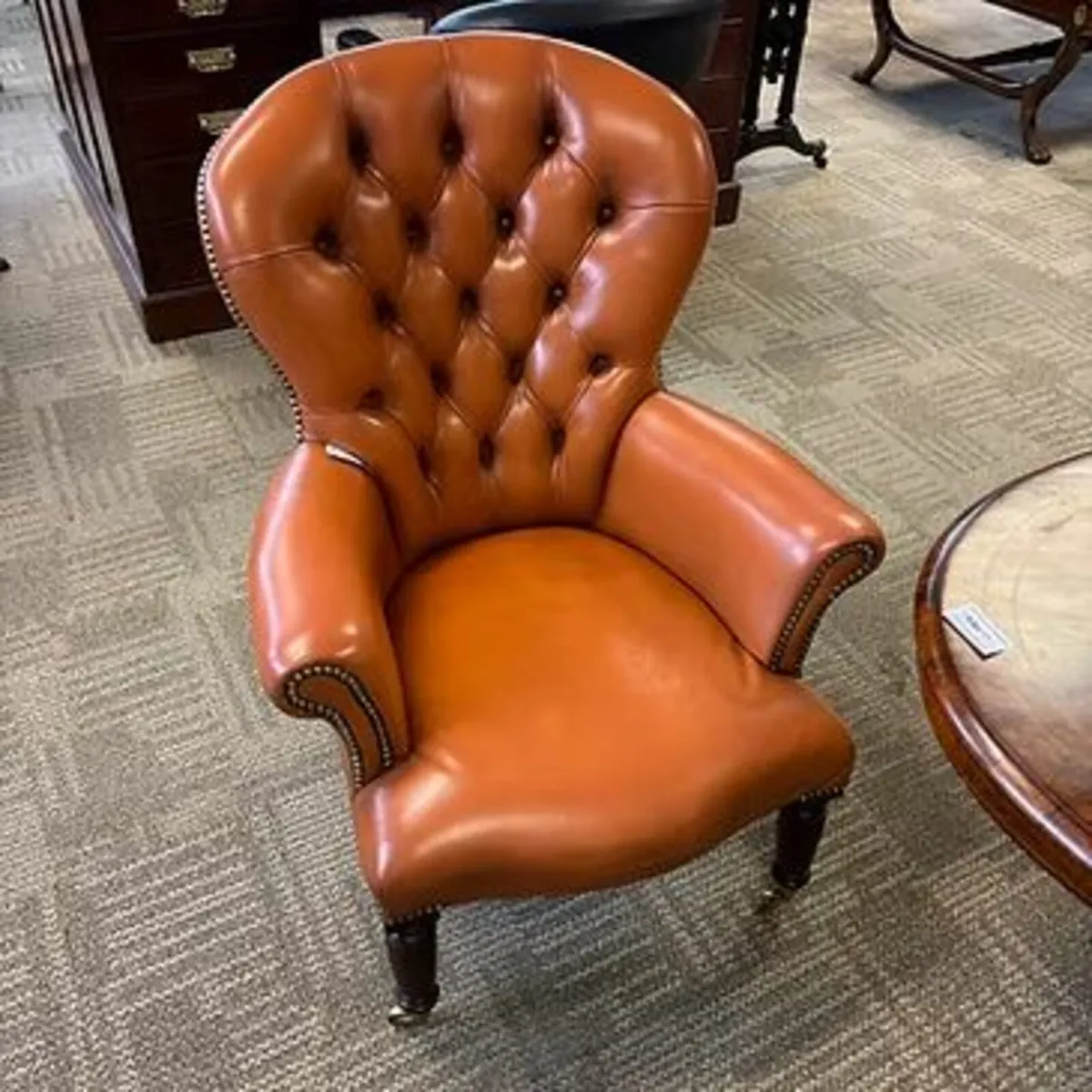 Victorian style tan leather Chesterfield armchair