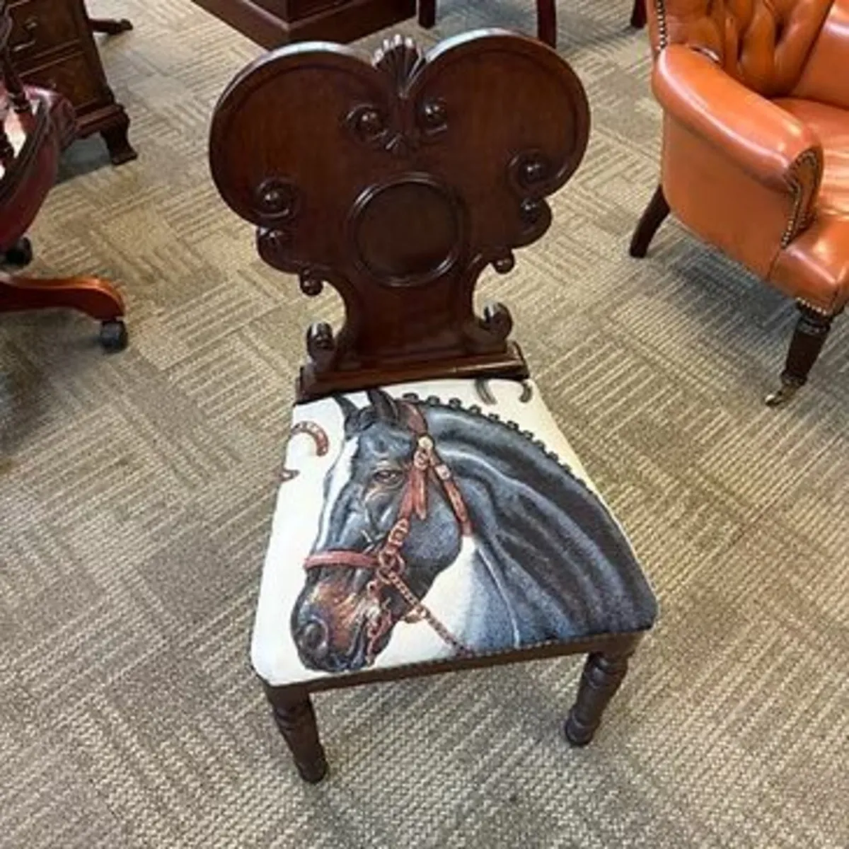 Edwardian mahogany occasional chair with horse hea
