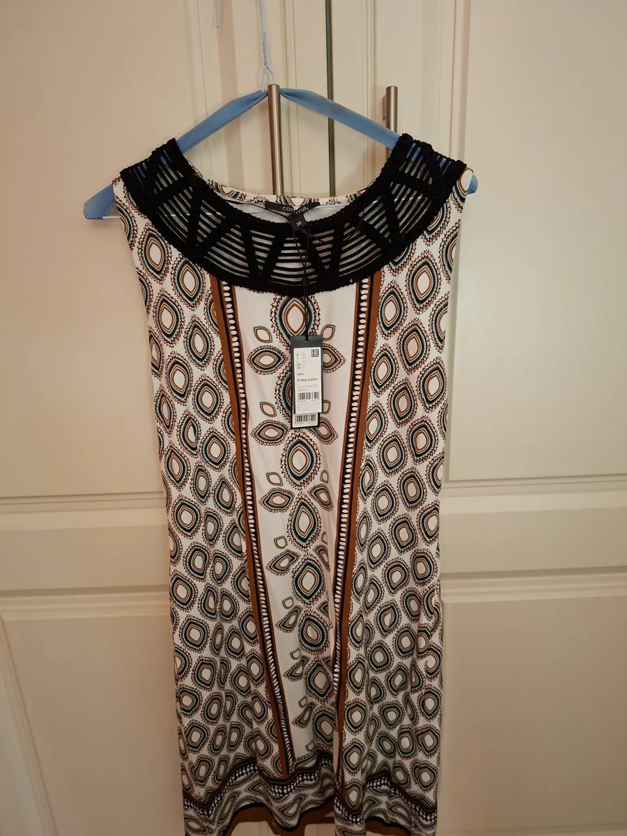 Jumpsuit and Dresses - Image 3