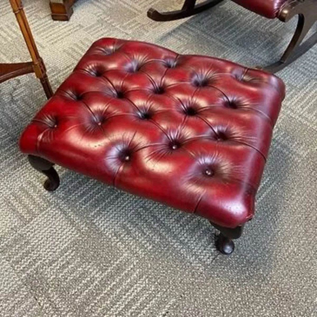 Fabulous deep red leather buttoned footstool. Swip
