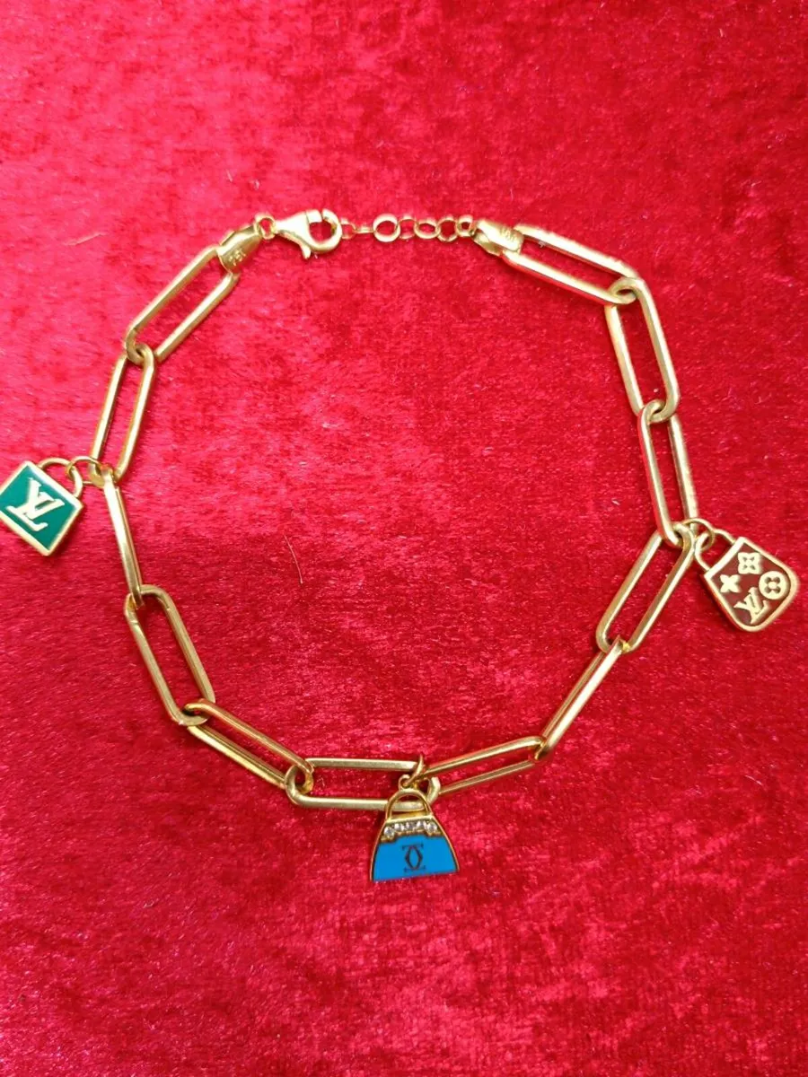 18k Yellow Gold Paperclip Bracelet With LV Charms - Image 2