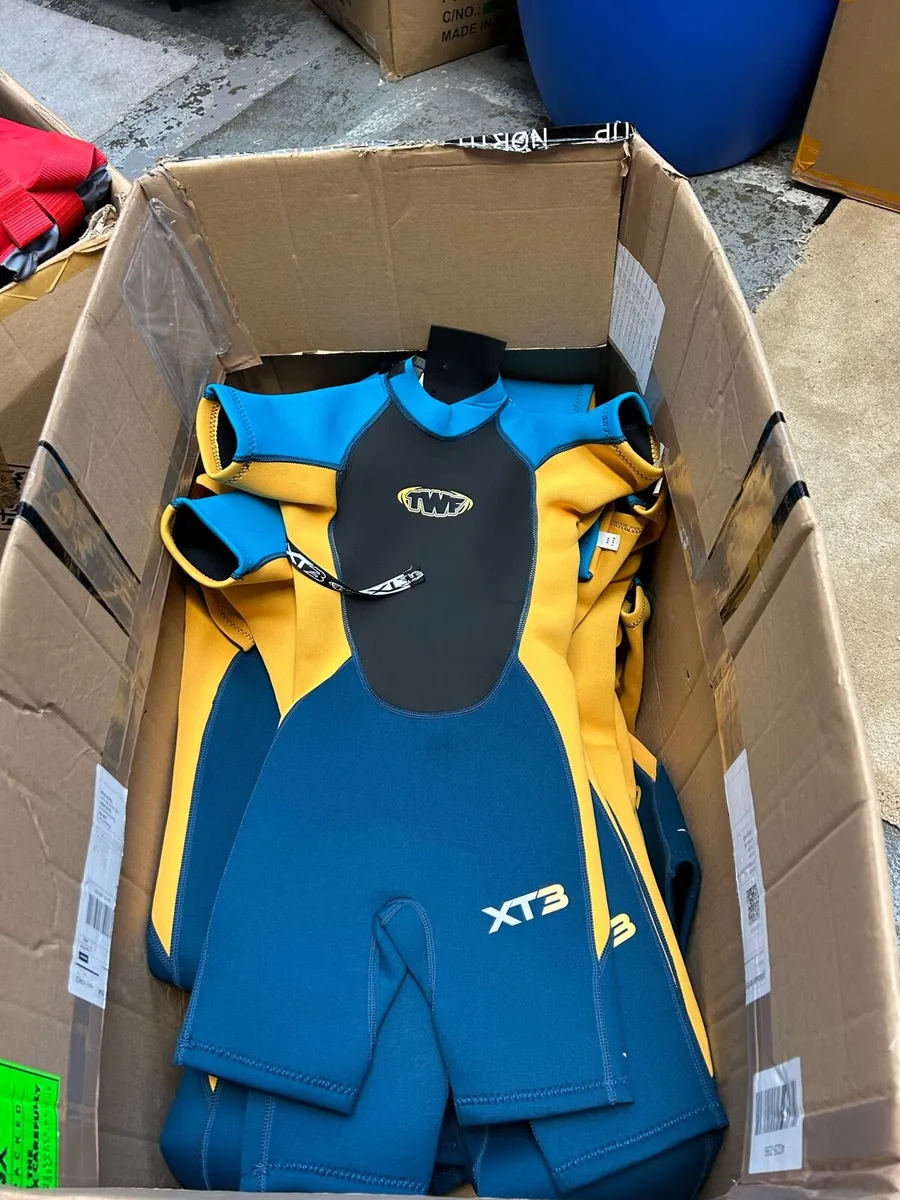 Box of 15 kids wetsuits