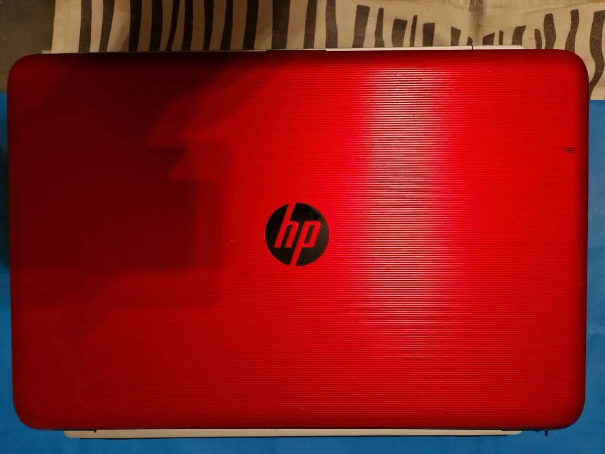 HP Laptop, AMD A6-7310 APU 2.0GHZ, 4GB, 1 TB,  RED - Image 1
