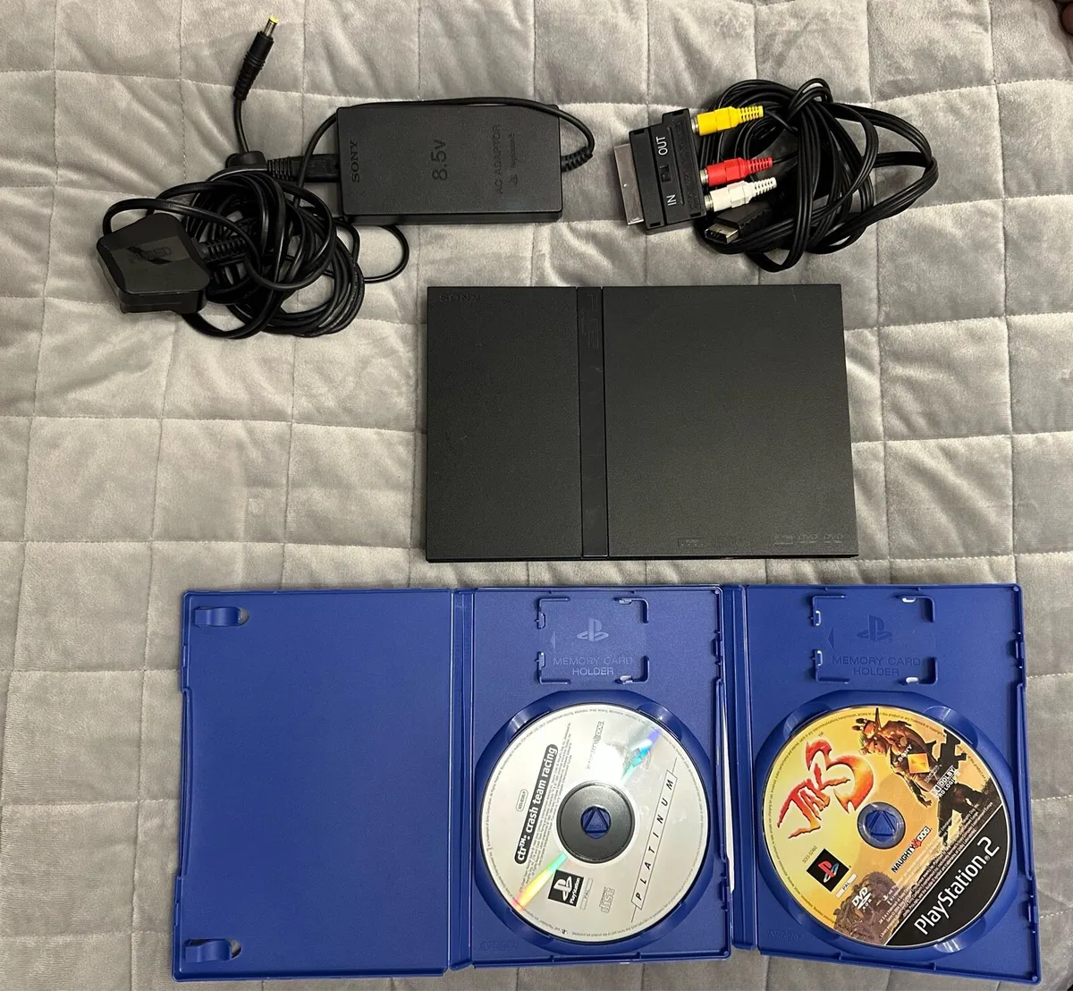 PlayStation 2 Slim Console & Cables & Games - Image 1