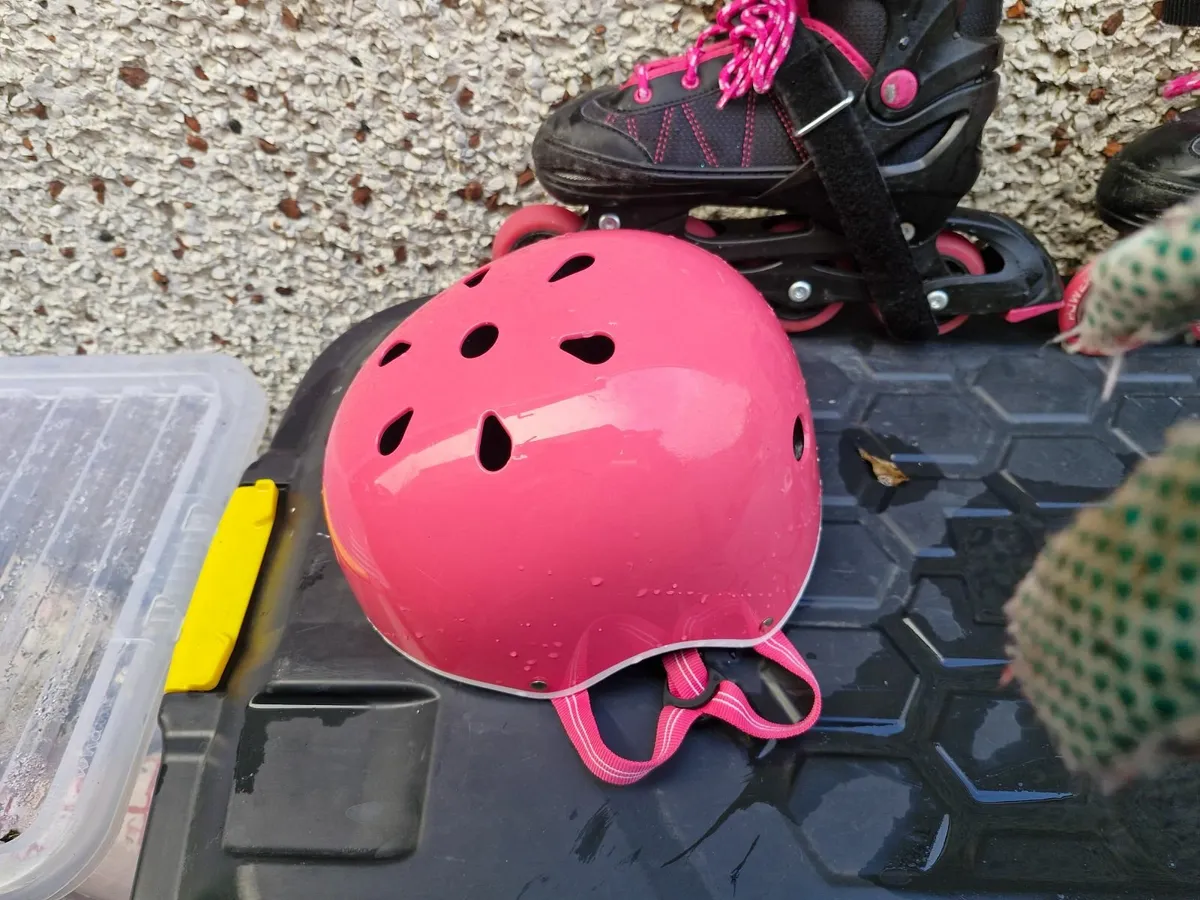 Roller skates and helmet - Image 1