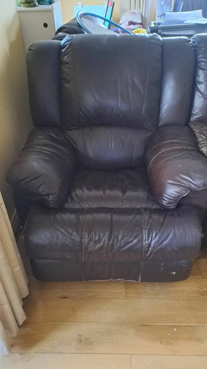 Two leather recliner armchairs