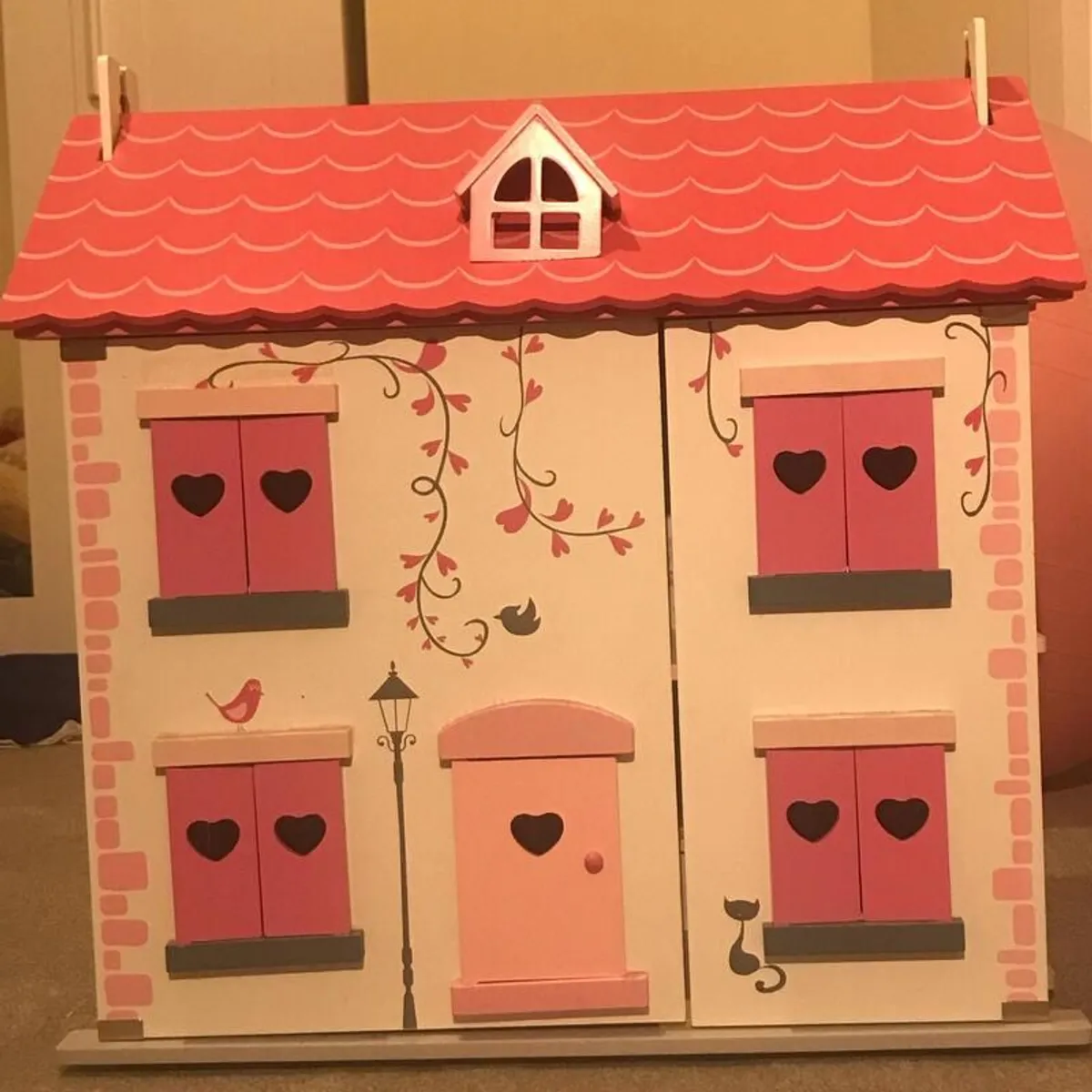 Wooden Dollhouse with Furniture in perfect condition - Image 1