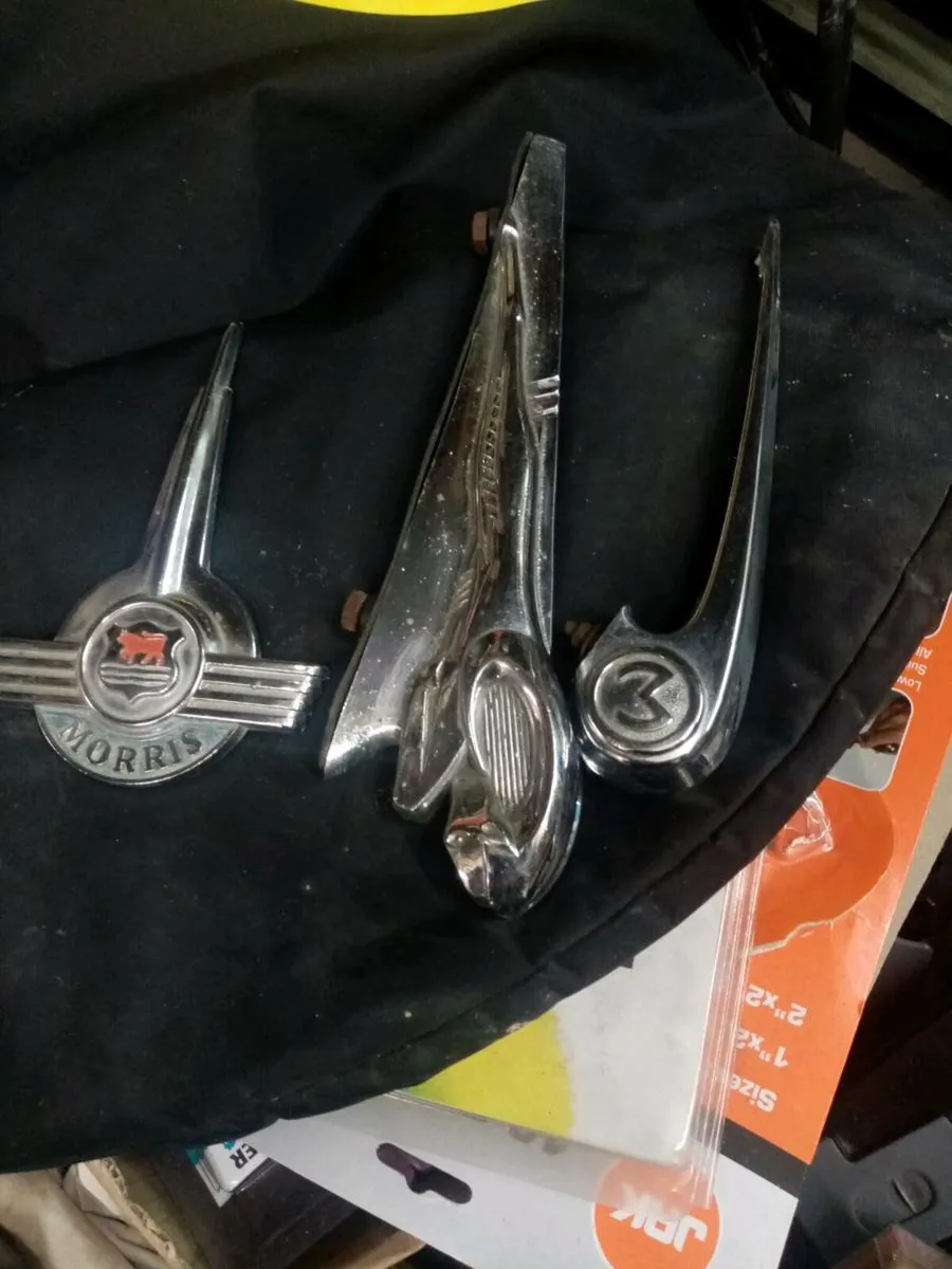 Four old car badges - Image 1