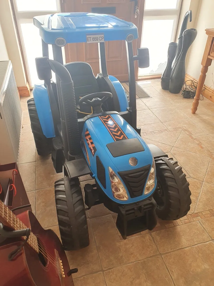 New Holland 24v Electric Blue Ride-on Tractor - Image 1
