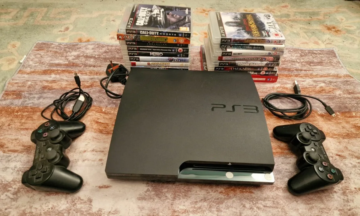 Play Station 3 (ps3) + 2 controllers & 17 games - Image 3