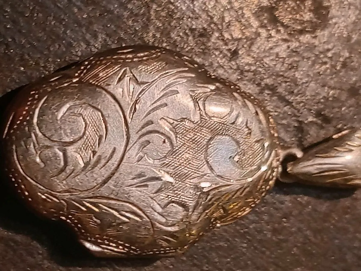 Silver locket, and silver bangle. - Image 1