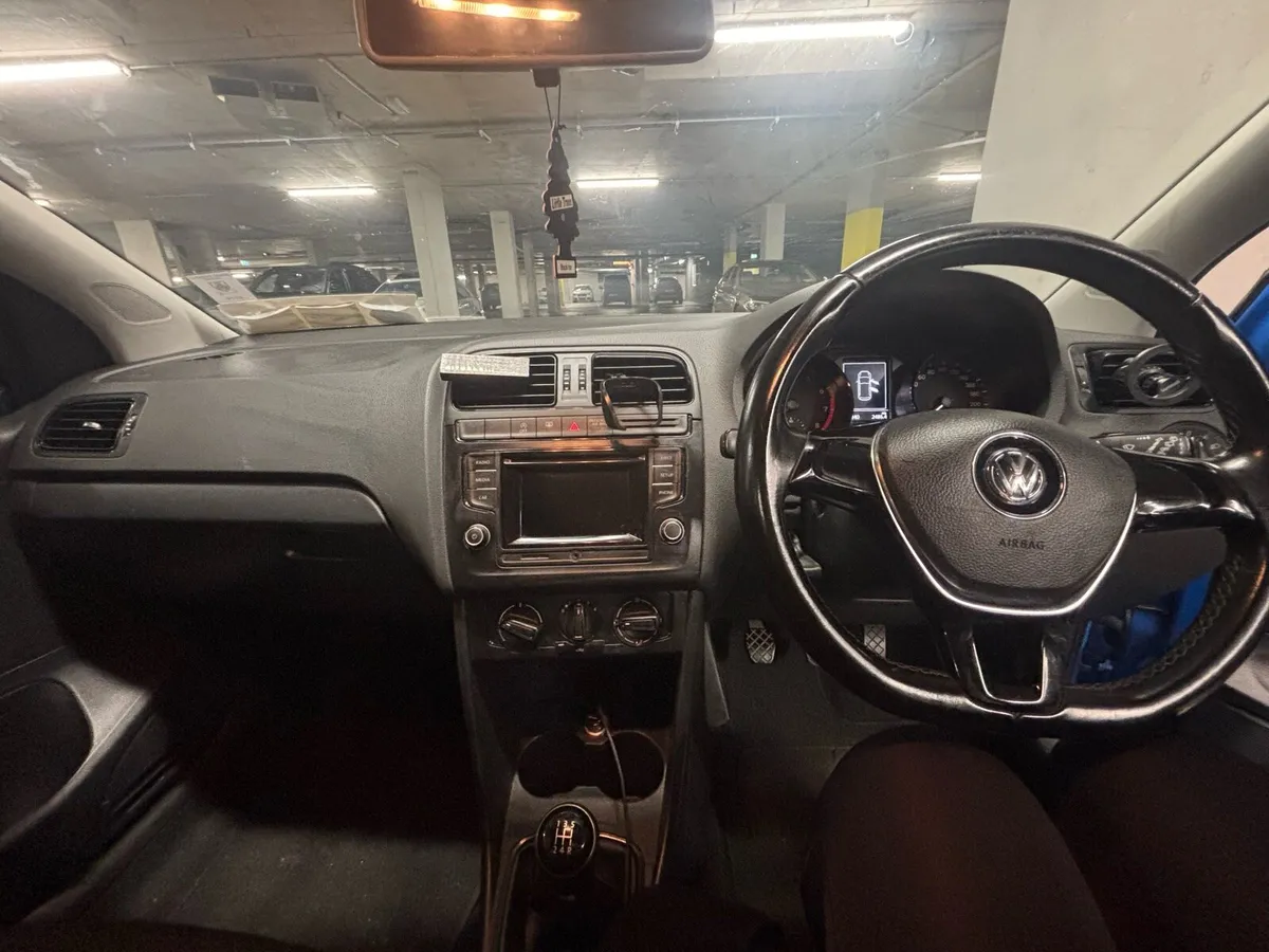 2015 Blue Volkswagen Polo. 1.0L - Image 3